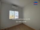 Minimalist bedroom with air conditioning unit and window