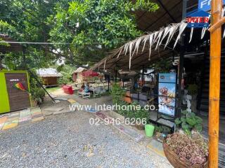 Outdoor seating area with greenery