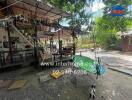 Outdoor view with a swing, seating area, and greenery