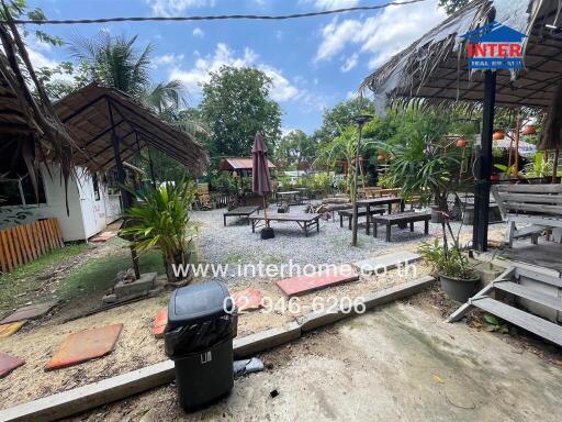 Outdoor area with seating and greenery