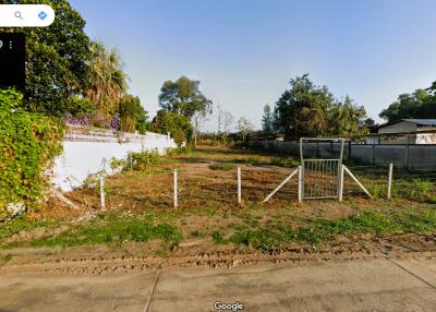 vacant land plot with fencing and some vegetation