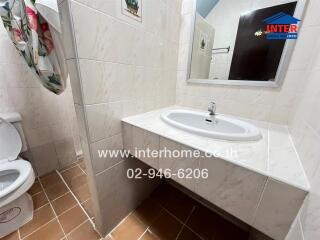 Clean and well-maintained bathroom with a sink and toilet