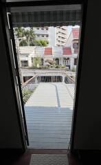 View from a balcony overlooking neighboring houses