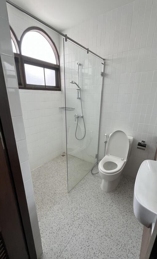 Modern bathroom with shower and toilet