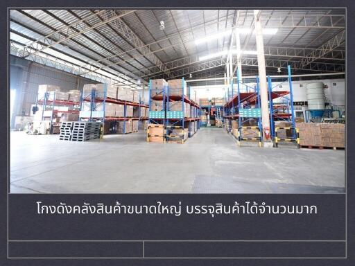 Spacious warehouse interior with shelving units and stored goods