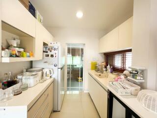 Modern kitchen with appliances and storage