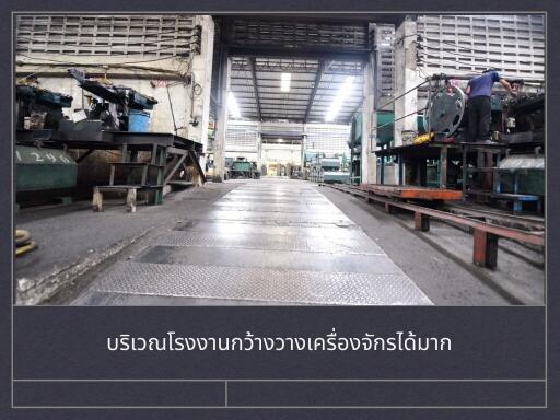 Interior of a large manufacturing workshop with heavy machinery