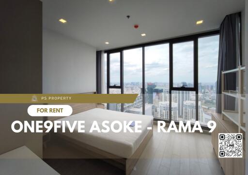 Modern bedroom with floor-to-ceiling windows and city view