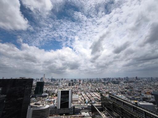 Aerial view of the city skyline with clouds