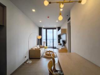 Modern living room with natural lighting and city view