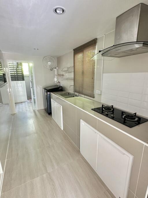 Modern kitchen with stainless steel appliances