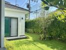 Beautiful garden with lush greenery and patio doors