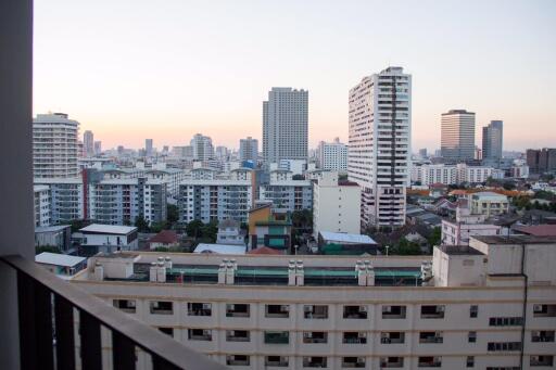 View from balcony overlooking city skyline