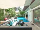 Outdoor seating area with poolside view