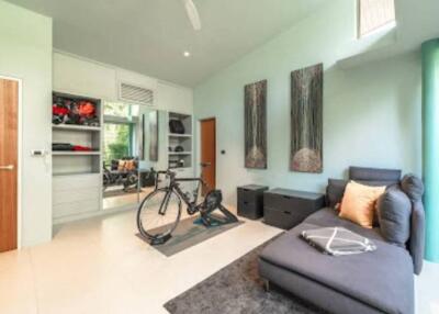 Modern living room with bicycle and chaise lounge