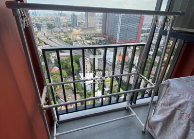 Balcony with city view and drying rack