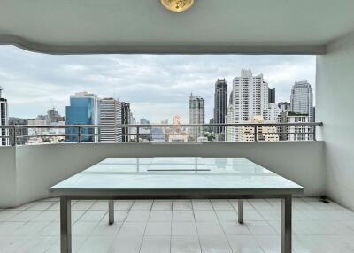 Spacious balcony with a view of the cityscape