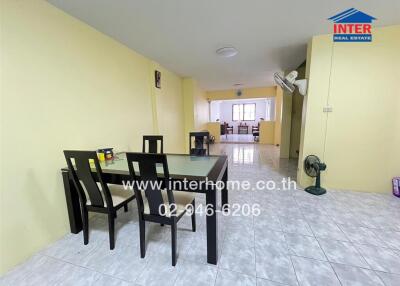 Dining area with table and chairs