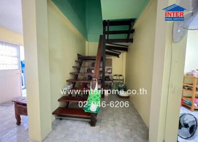 Interior view showing stairs and part of the living area