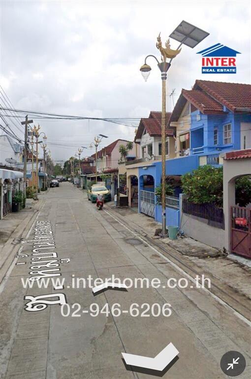 Street view of residential neighborhood with row houses