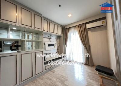 Modern living room with built-in cabinetry and large window with curtains