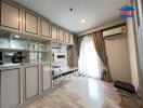 Modern living room with built-in cabinetry and large window with curtains