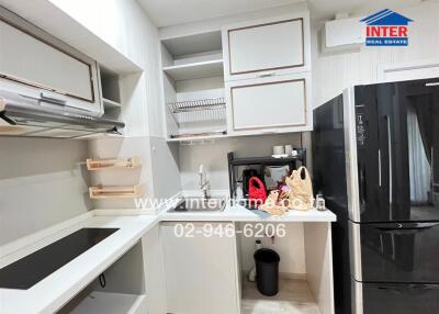 Modern kitchen with sleek appliances and ample storage