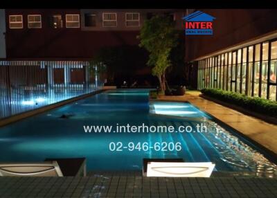 Outdoor swimming pool of a building at night