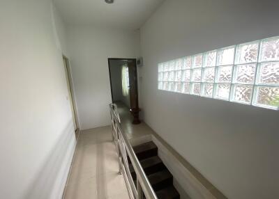 Hallway with glass block window