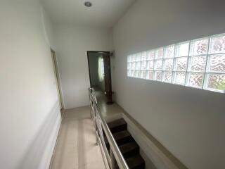 Hallway with glass block window