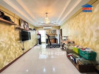 Well-lit and spacious living room with modern decor