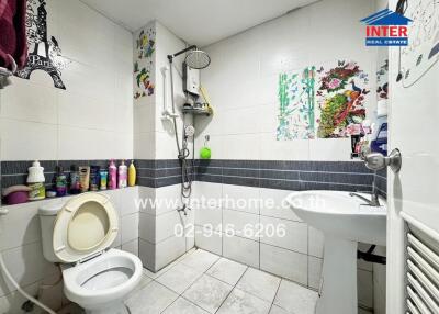 Bathroom with toiletries and shower