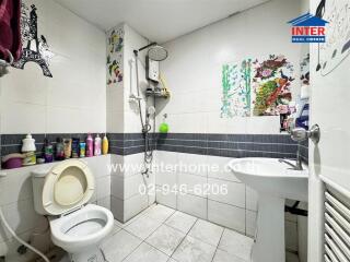 Bathroom with toiletries and shower