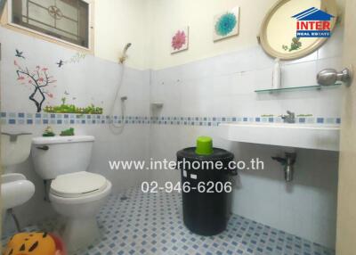 Clean and modern bathroom with toilet and shower