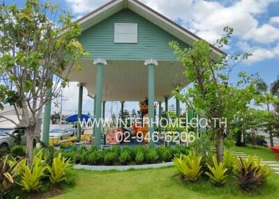 Front view of a house with a garden