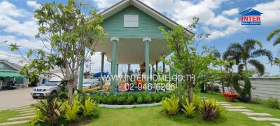 Front view of a house with a garden