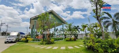 Green house with a garden