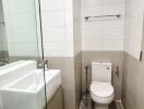 Modern bathroom with tiled walls and floor