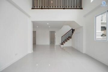 Spacious living room with a mezzanine floor and modern finishes