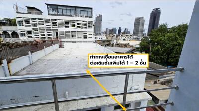 View of a building rooftop with potential for adding 1-2 floors