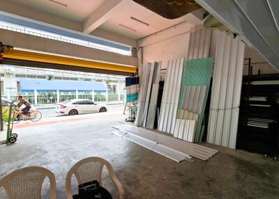 Interior view of a garage with open door