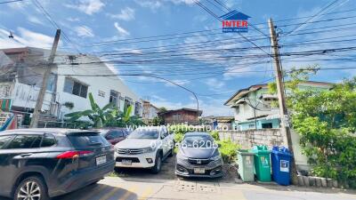 Neighborhood street view with parked cars