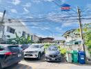 Neighborhood street view with parked cars