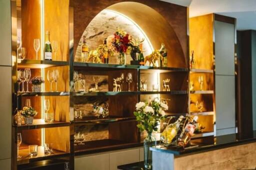 Elegant kitchen with decorative shelves and wine glasses