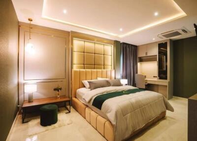 Modern bedroom with stylish lighting and cozy décor