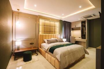 Modern bedroom with stylish lighting and cozy décor