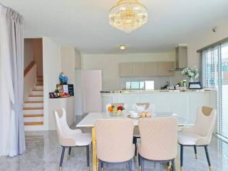 Modern dining area adjacent to kitchen