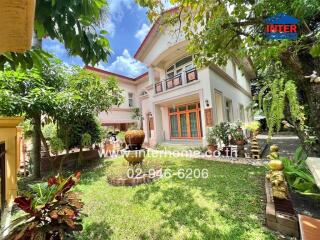 Exterior view of a house with a garden