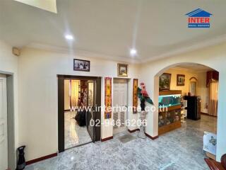 Spacious living room with decorative elements and modern fixtures