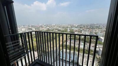 View from apartment balcony overlooking cityscape